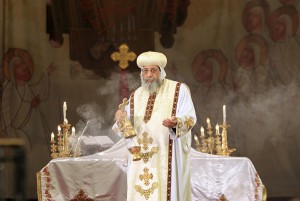 Pope Tawadros II, the 118th Pope of the Coptic Orthodox Church of Alexandria and Patriarch of the See of St. Mark Cathedral, leads mass prayers for the Egyptians beheaded in Libya, at Saint Mark's Coptic Orthodox Cathedral in Cairo, February 17, 2015. Egyptian President Abdel Fattah Al-Sisi called for a United Nations resolution mandating an international coalition to intervene in Libya after Egypt's airforce bombed Islamic State targets there. Egypt directly intervened for the first time in the conflict in neighbouring Libya on Monday after an Islamic State group in the country released a video showing the beheading of 21 Egyptian Christians. REUTERS/Mohamed Abd El Ghany (EGYPT - Tags: POLITICS RELIGION CONFLICT CIVIL UNREST)
